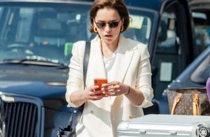 Emily airport street pats Ya Clark, white suit jea