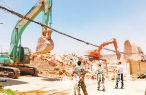 Kunming is pulled via opening area A street demolish more than mus 190 to face violate a building to