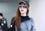 New son's wife shows body airport after Tang Yan 