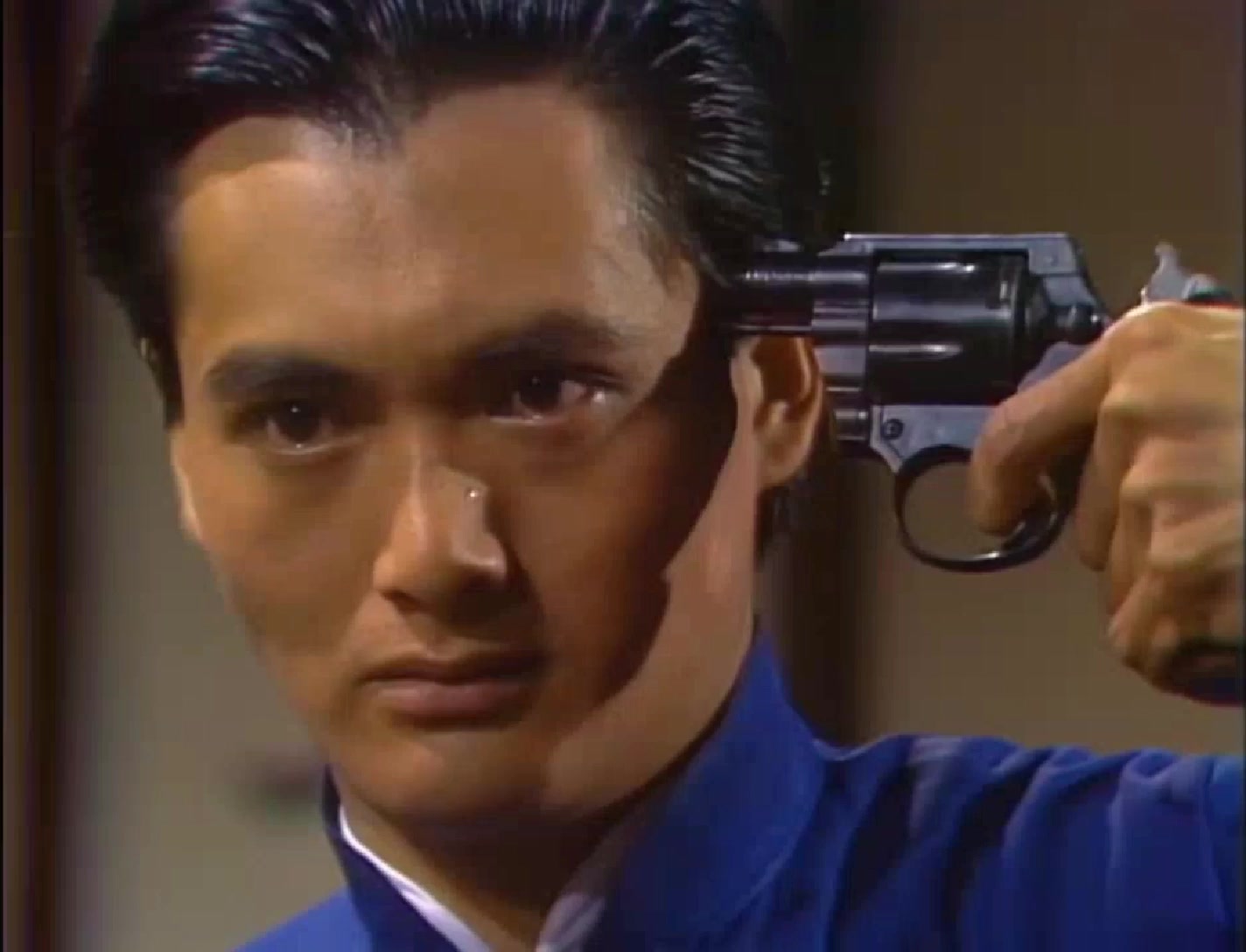 上海滩里的许文强年轻时的周润发文哥来一支够狠